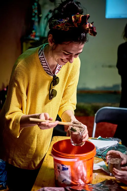 A workshop with attendees gathered around the table at Love Shack